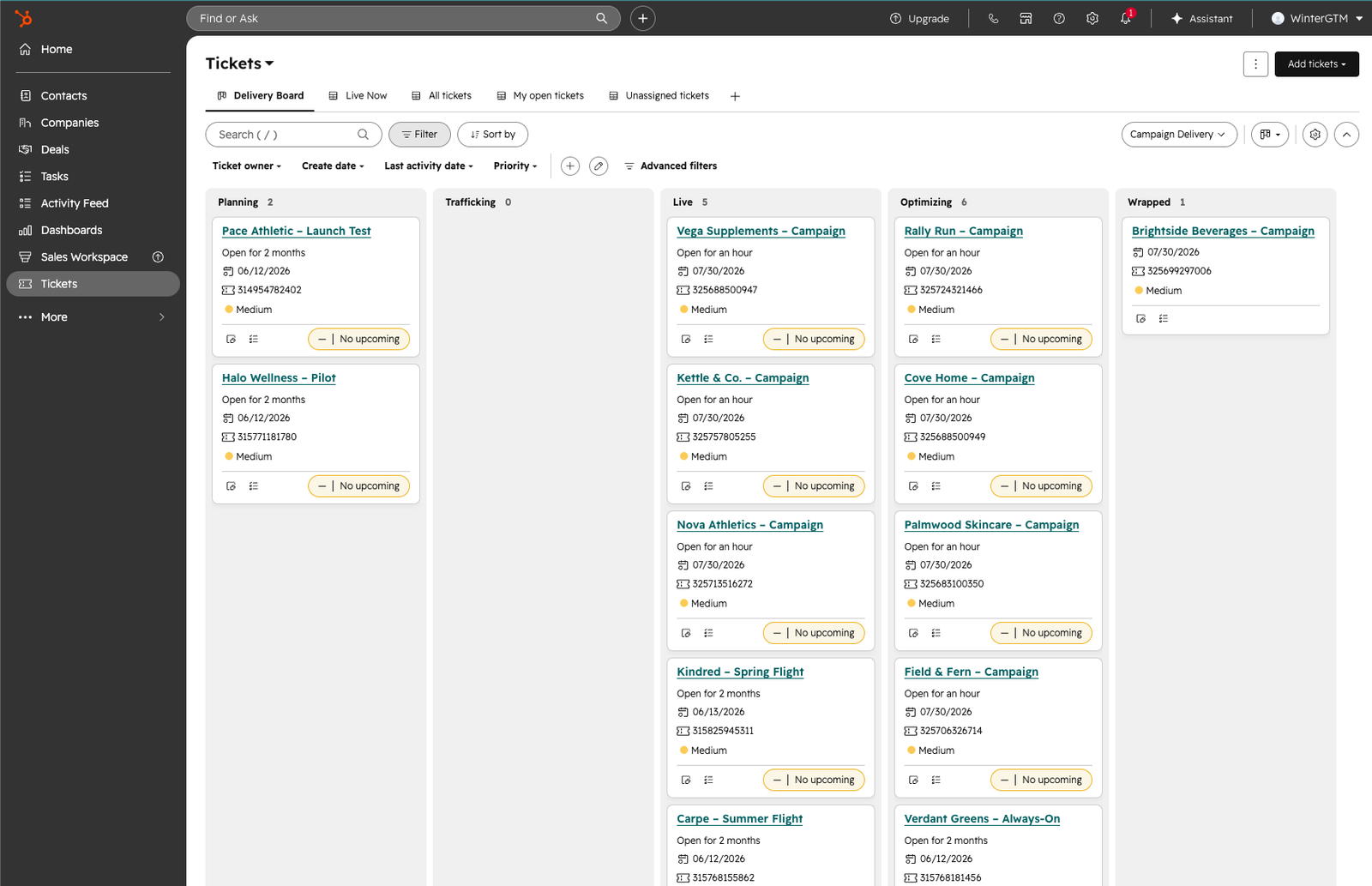 The Campaign Delivery board (kanban) with brand campaigns across Planning, Live, and Optimizing stages.